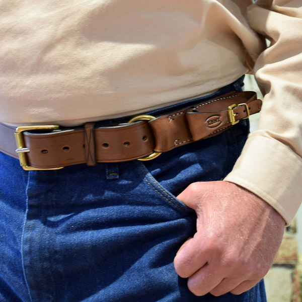 1 1/2" (38mm) Stockmans Belt, Solid Leather, with Brass Roller Buckle and Ring and Pouch for Pocket Knife - Worn - Closeup